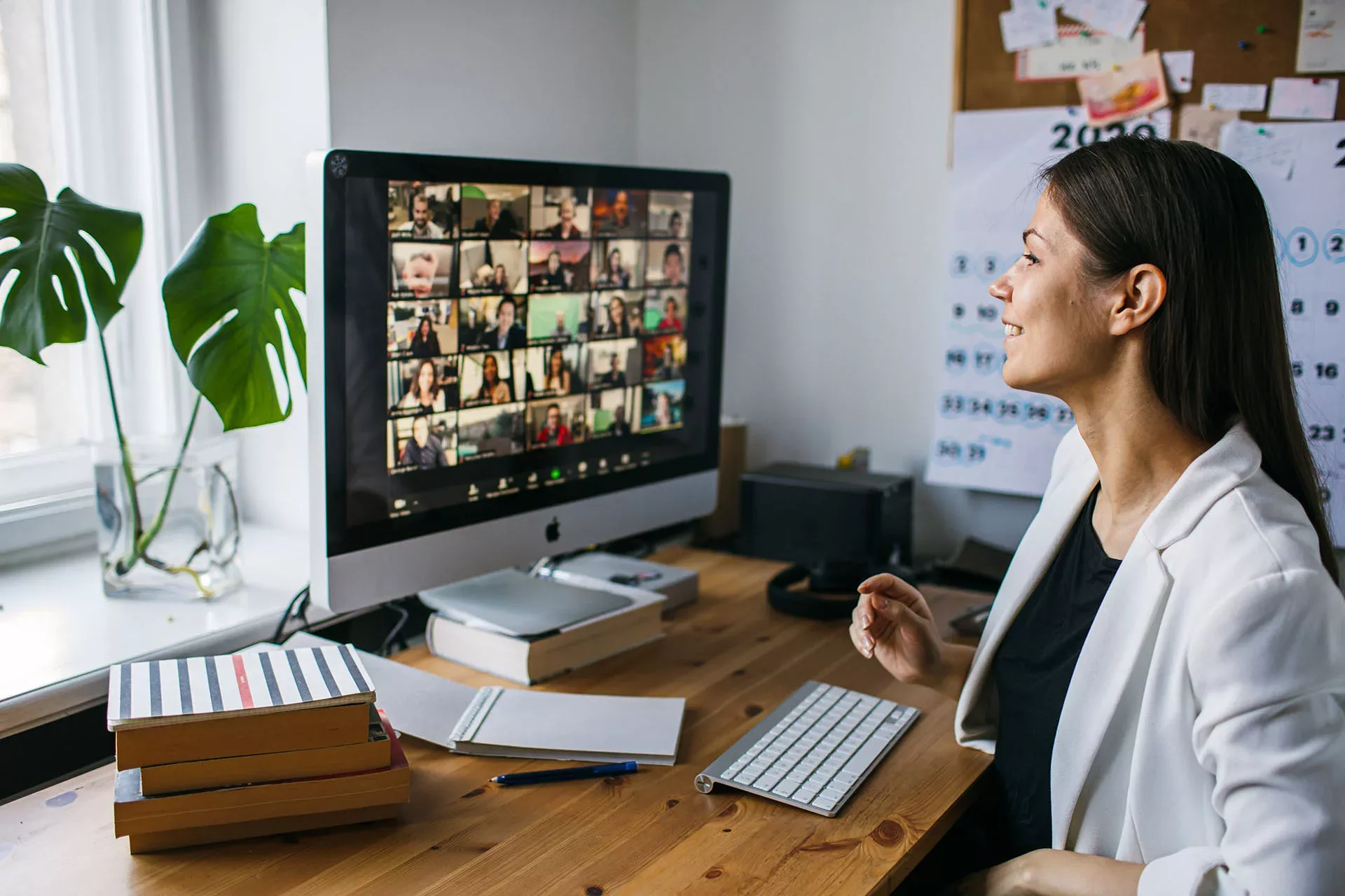 Woman on online meeting with office team